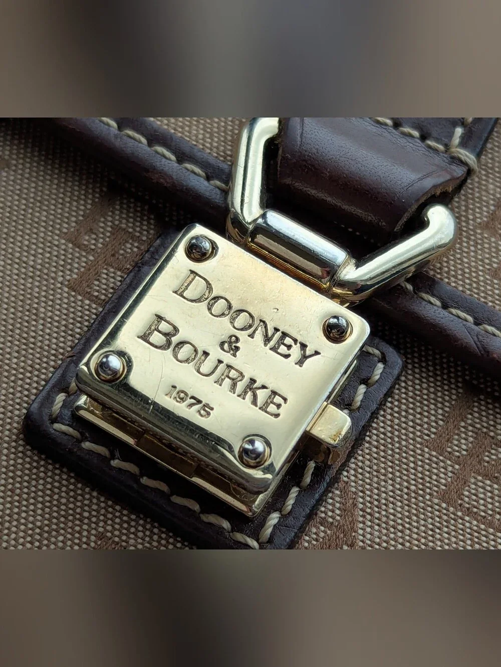 Dooney & Bourke Brown Signature Clutch Wallet